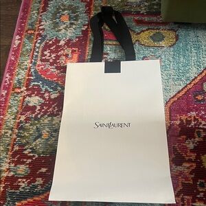 Saint Laurent Black and White store Bag